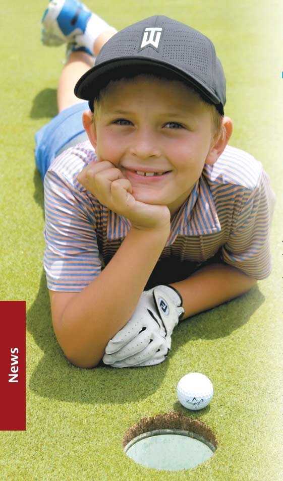 Jack Castle - Junior Golfer at Pittwater Golf Centre - Laying Down on Green